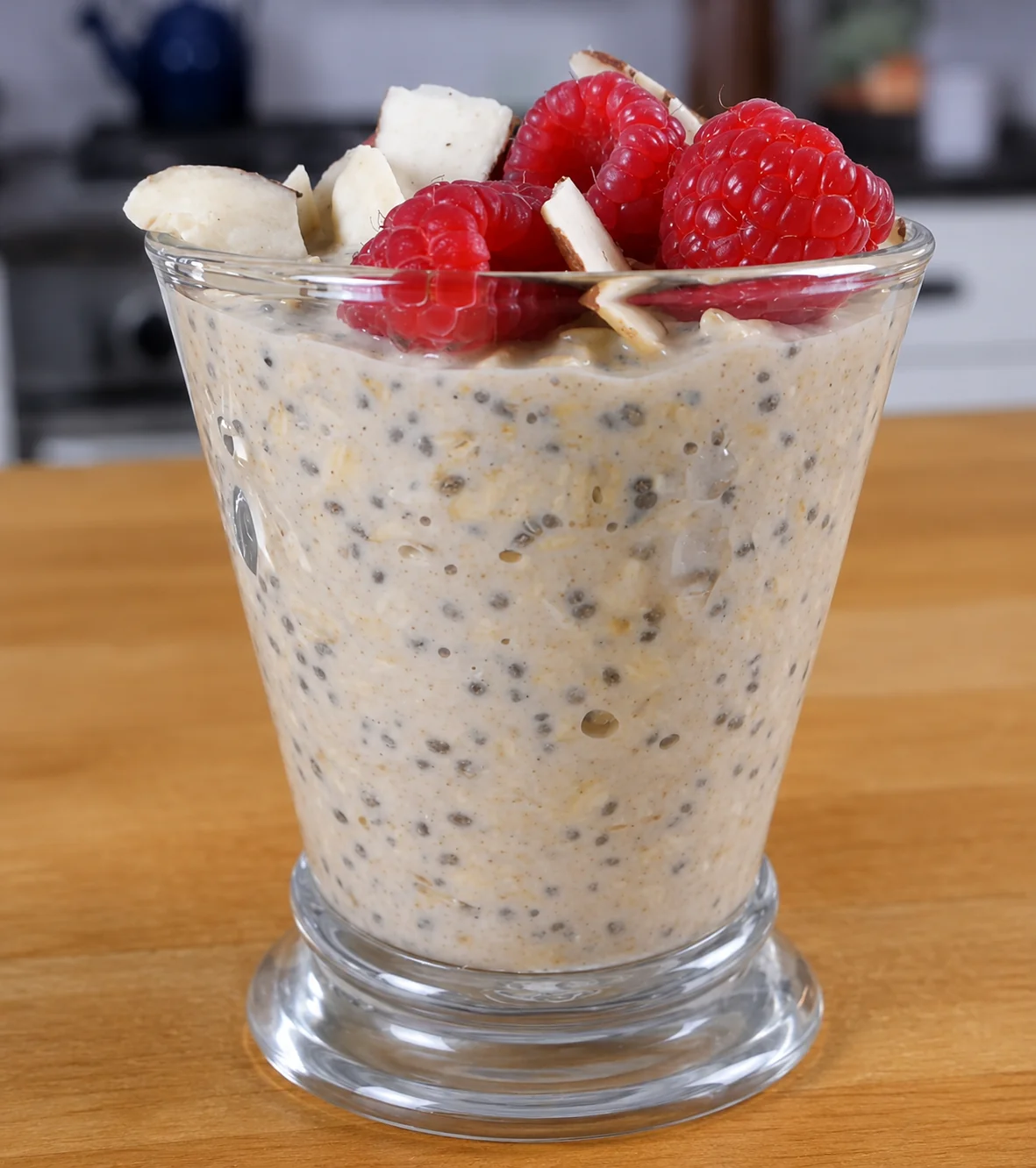 A jar of basic overnight oats topped and ready to eat