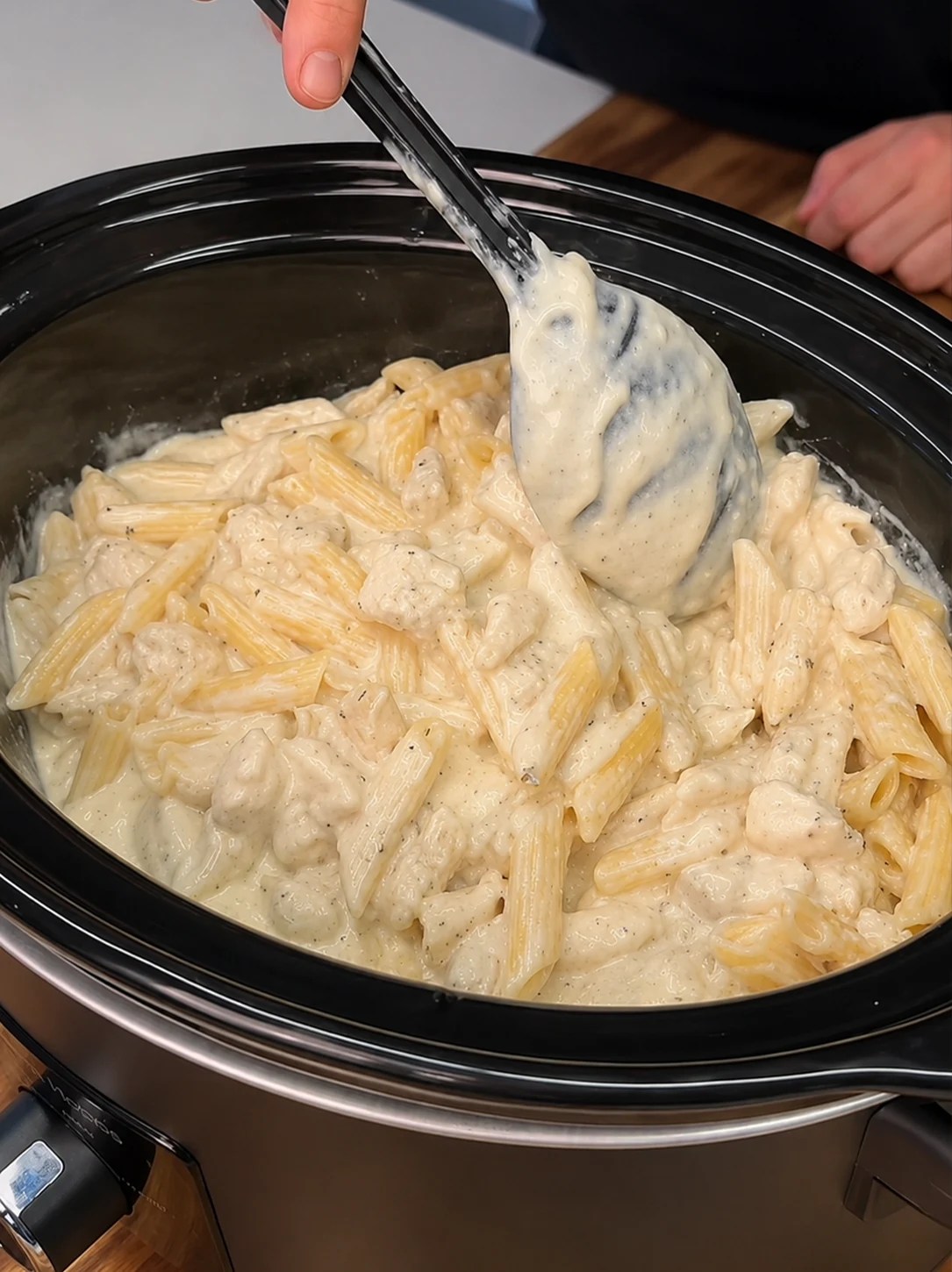 Creamy Cajun chicken protein Alfredo pasta in a slow cooker