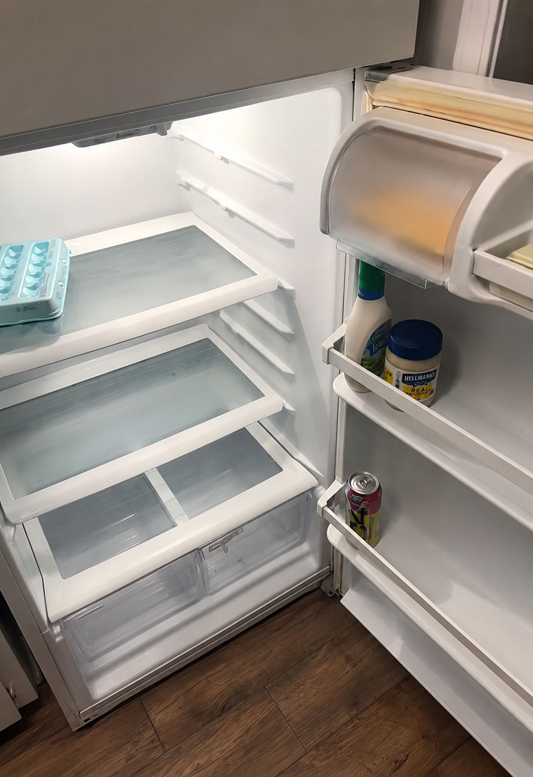 Empty fridge before a cheap meal prep grocery reset