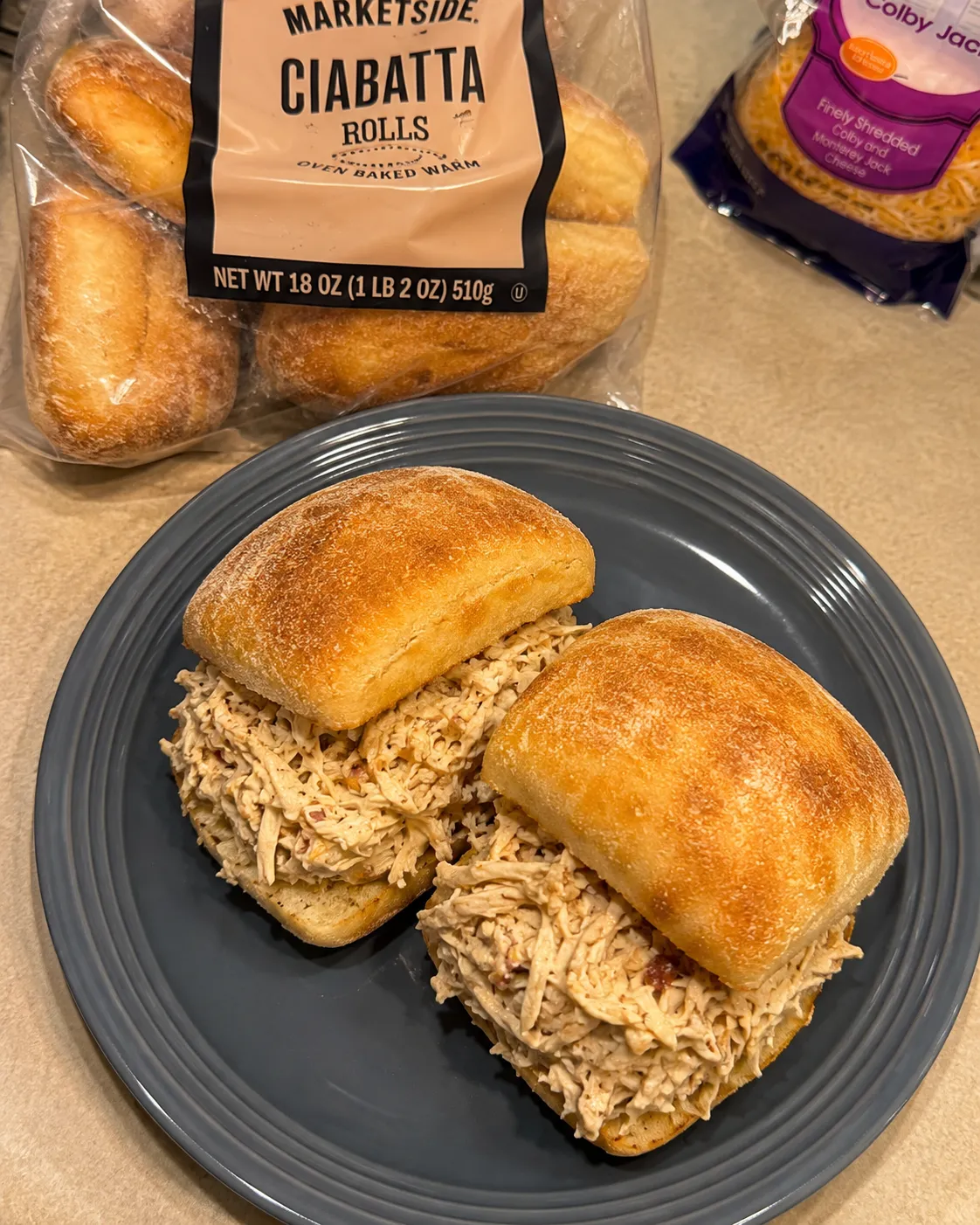 Shredded ranch chicken sandwiches on ciabatta rolls
