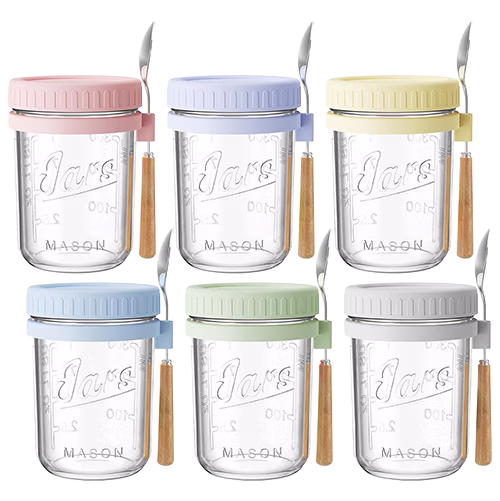 Glass overnight oats mason jars with lids and spoons