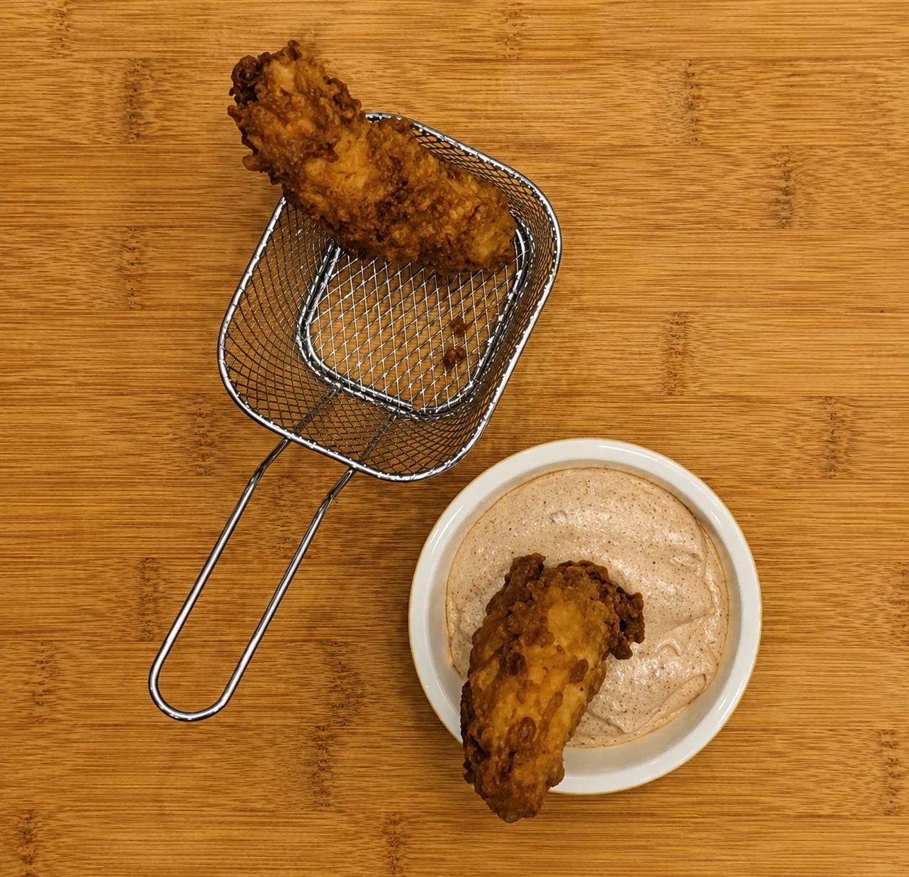 Copycat Popeyes blackened ranch in a small bowl ready for dipping