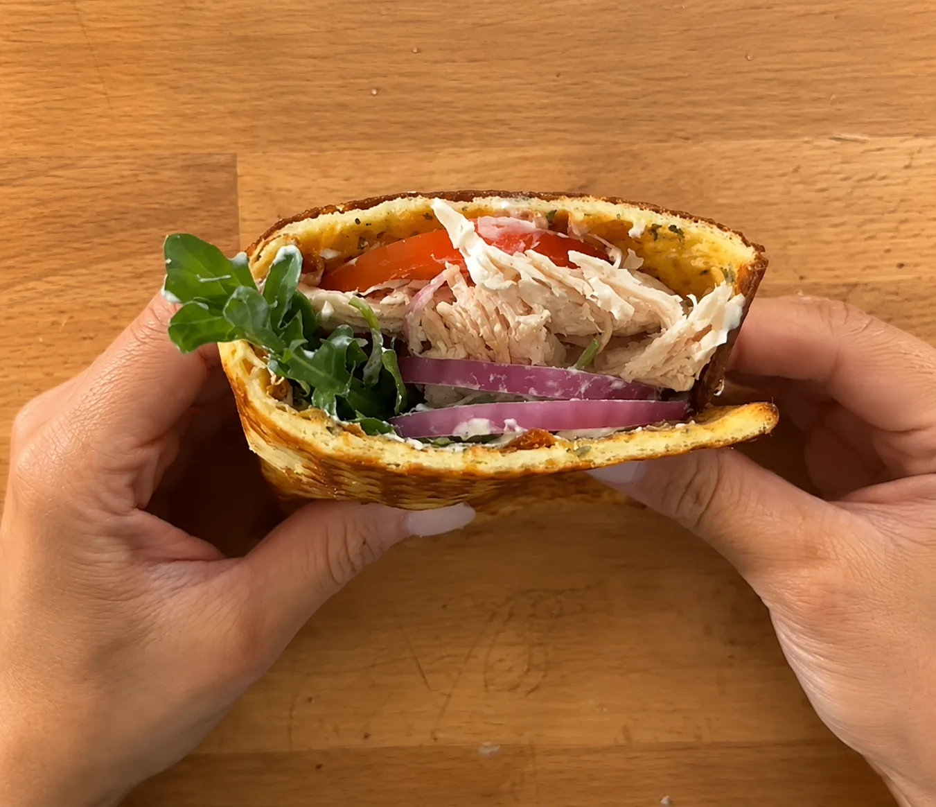 Viral cottage cheese flatbread folded into a high-protein wrap with chicken and greens