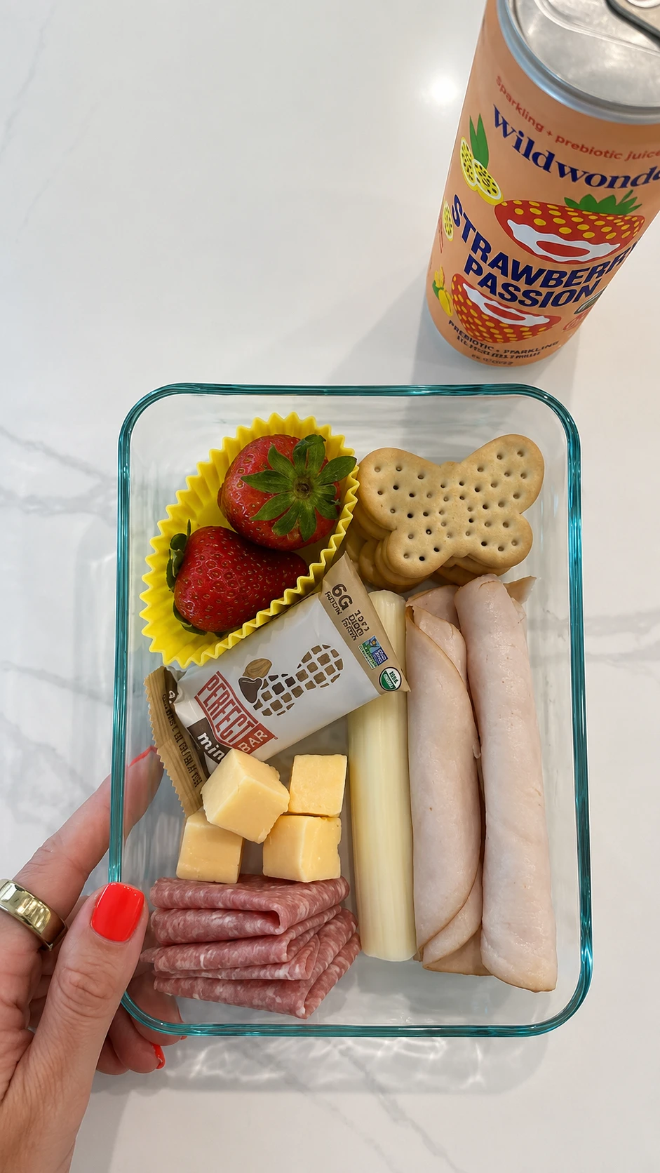 Adult lunchables box with turkey, cheese, crackers, and fruit
